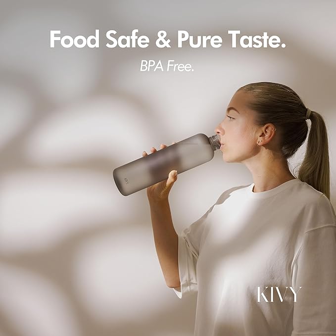 KIVY Slim Water Bottle 32oz [Lightweight & Shatterproof] Fits Backpack & Cupholder for Travel, Sports, School, Gym - Clear water bottle with measurements - Transparent Tritan Black - Dishwasher Safe